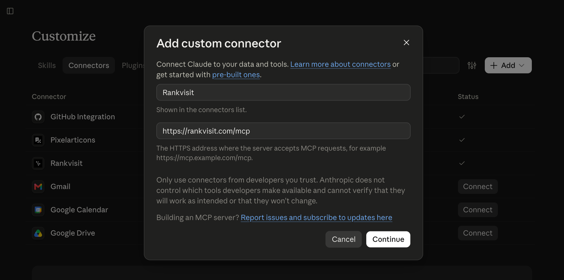 The Add custom connector dialog in Claude with the name Rankvisit and the URL https://rankvisit.com/mcp